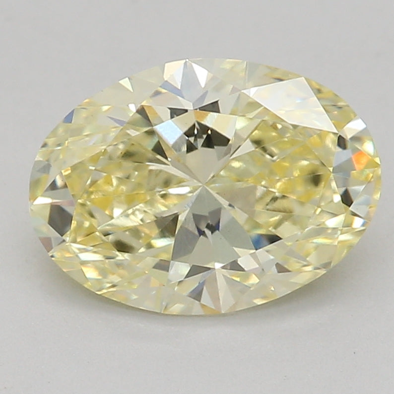 Laboratoriedyrket diamant 1,09 ct, oval, gul, VS1