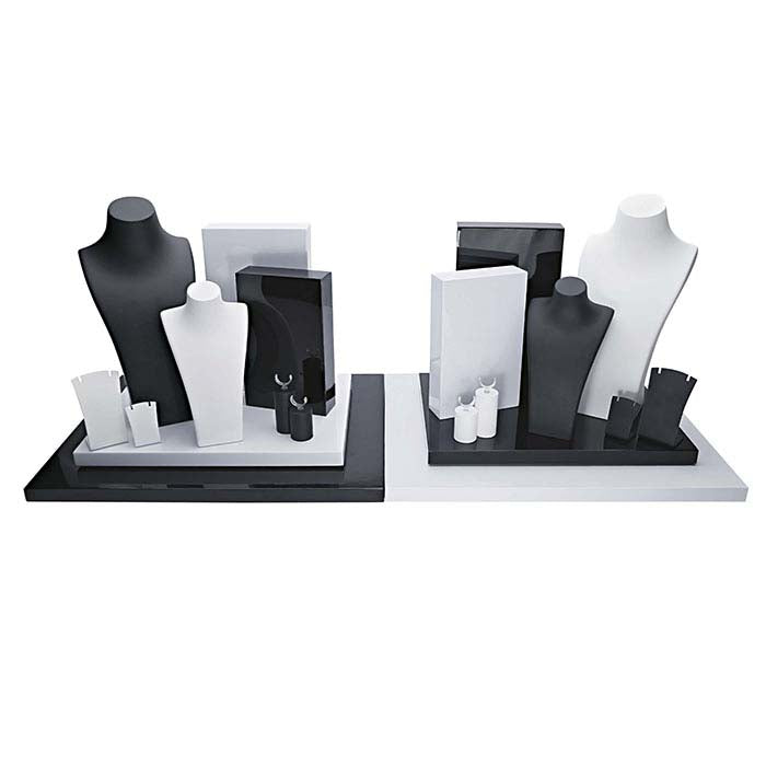 Rechteckiges Blockdisplay aus glänzend weißem Kunststoff