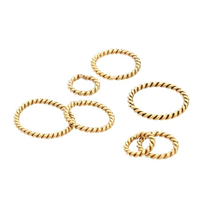 Кольцо закрытое из желтого золота 14/20 с круглой скрученной проволокой