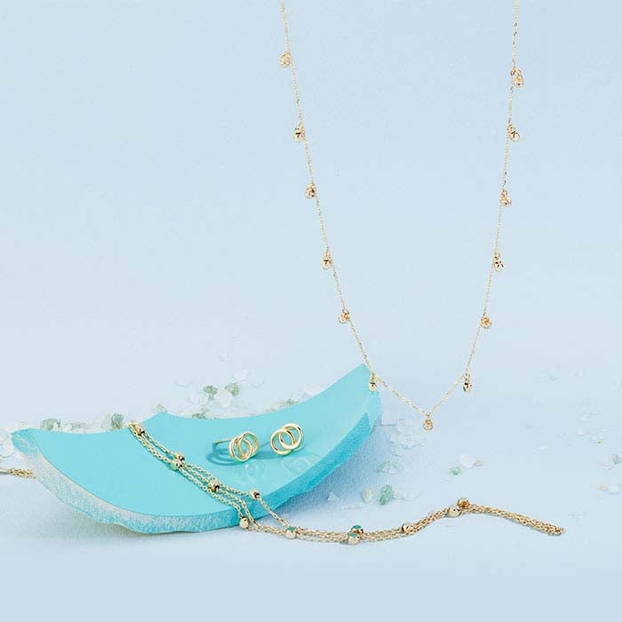 14 Karat Gelbgold, mit Zirkonia besetzte Halskette mit mehreren Anhängern